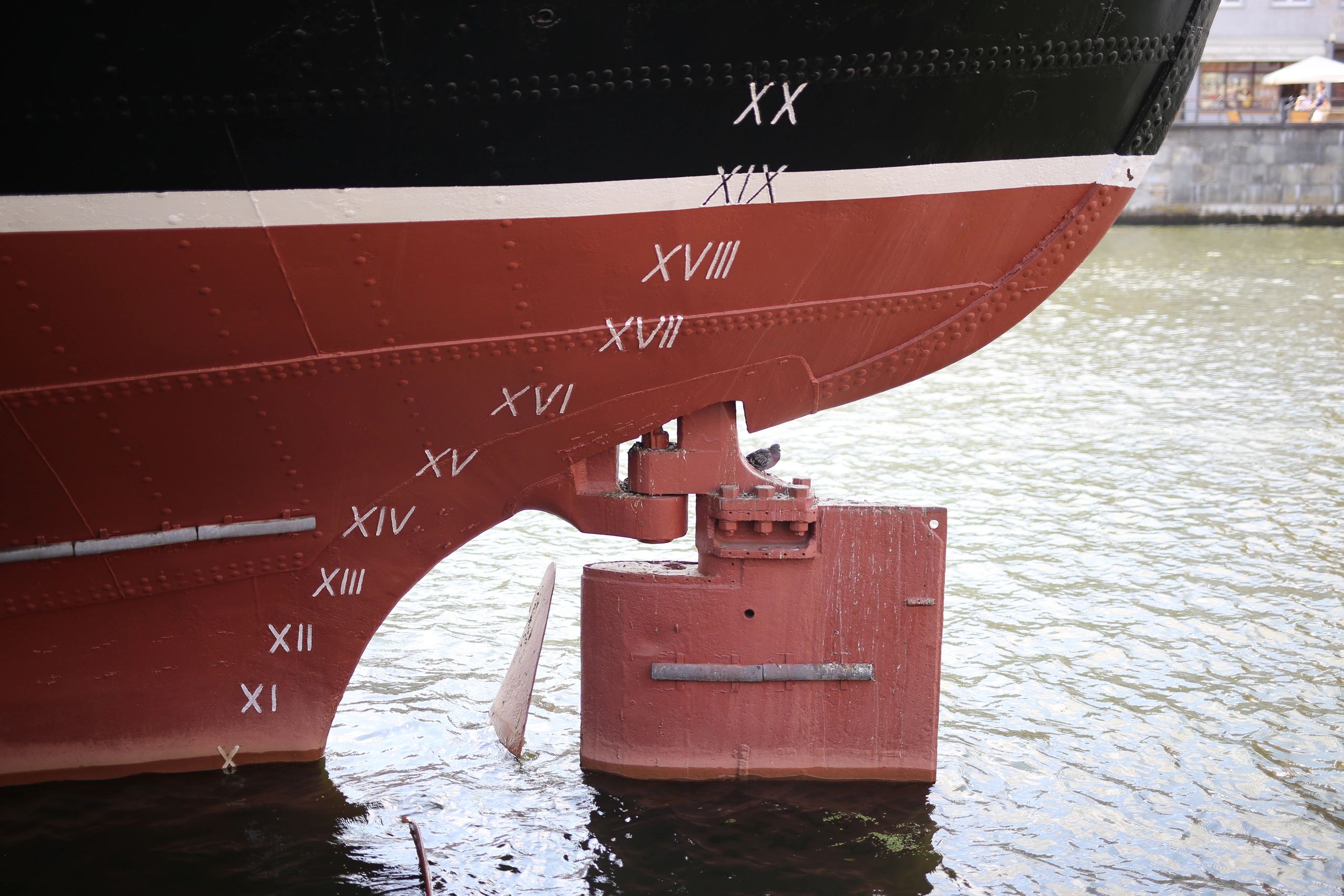 Boat in port representing marine canvas service
