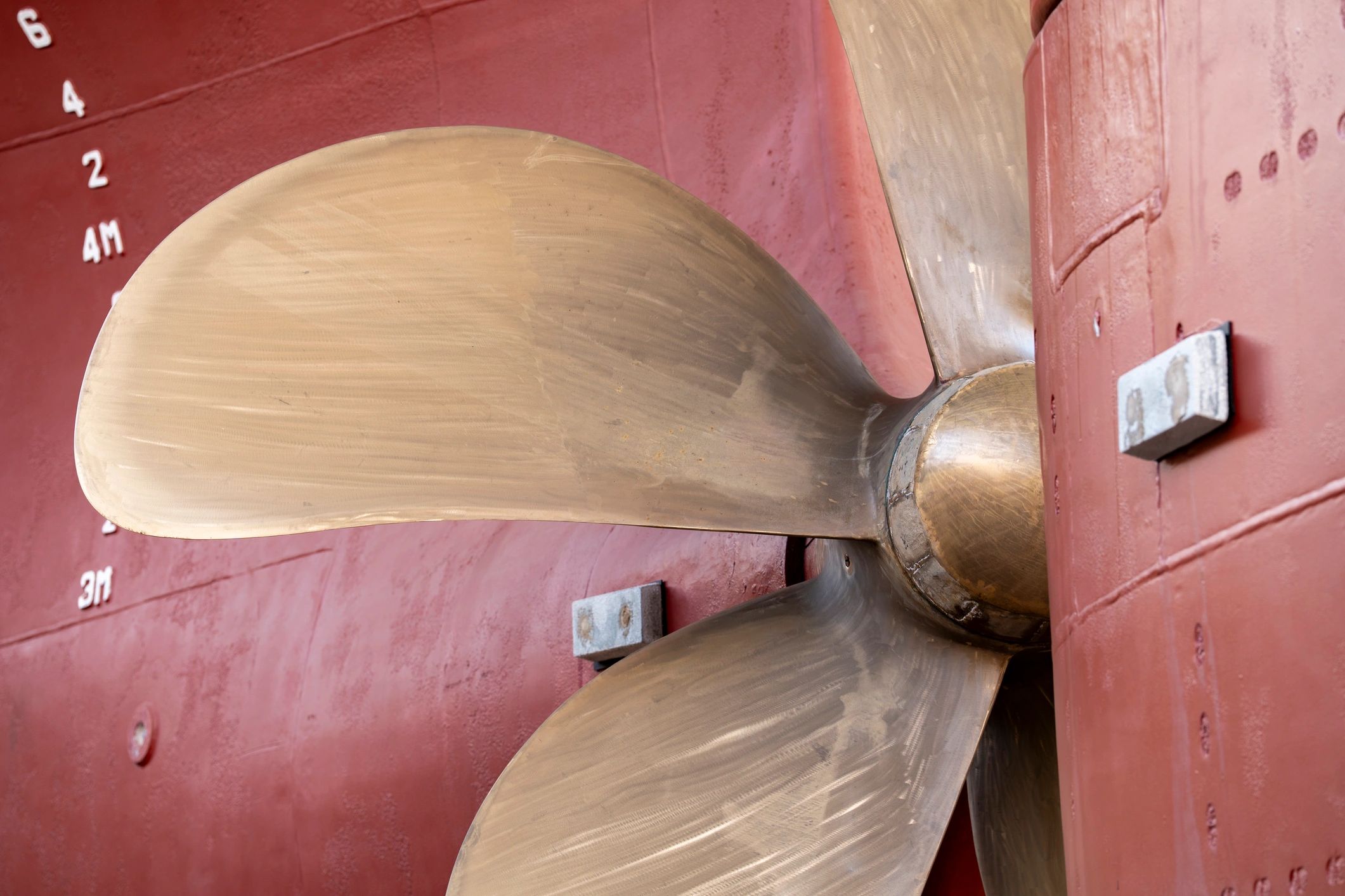 Boat propeller and hull in a repair setting