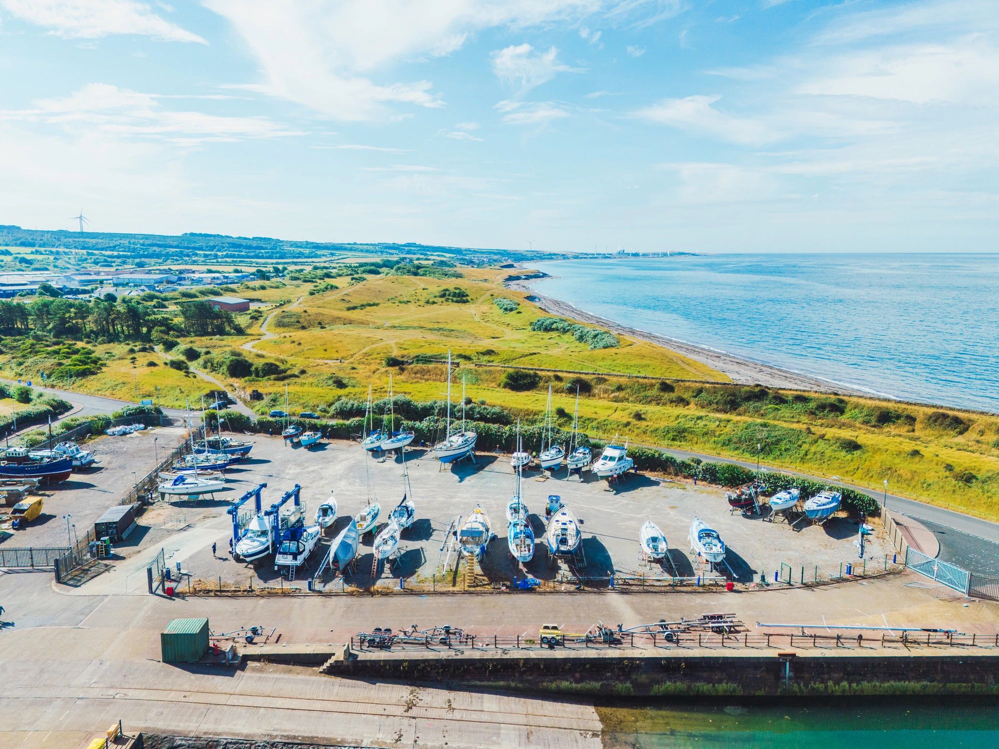 Boats at a marina awaiting maintenance service